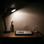 black desk lamp on brown wooden table